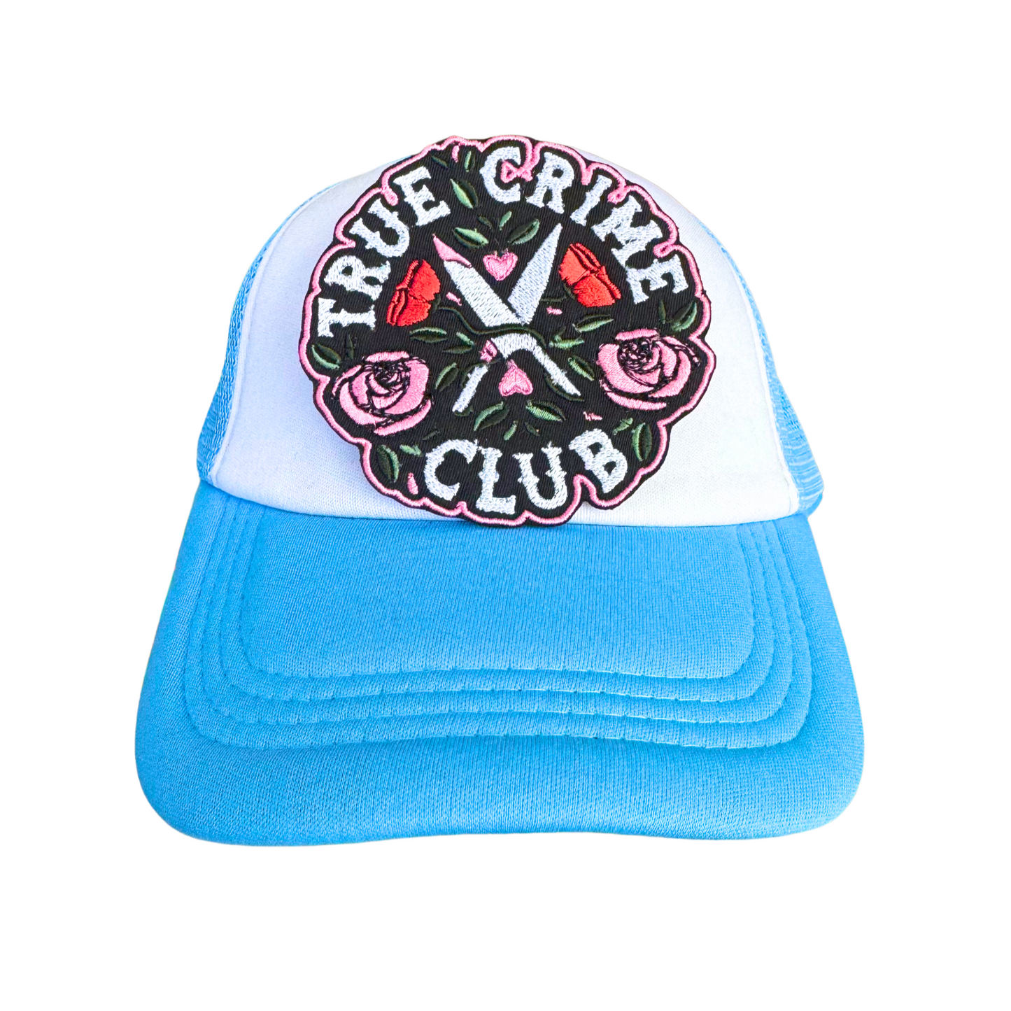 Trucker hat styled with the True Crime Club embroidered patch, perfect for crime documentary lovers and mystery fans.