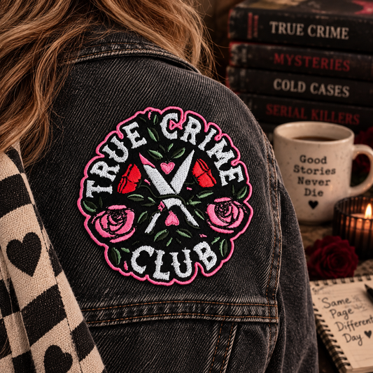 True Crime Club embroidered patch worn on a charcoal denim jacket