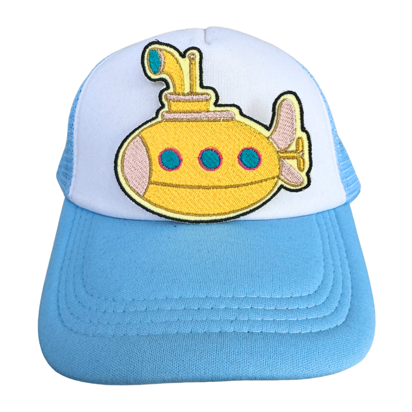 Blue and white trucker hat featuring the Yellow Submarine embroidered patch, handmade and ready to wear.