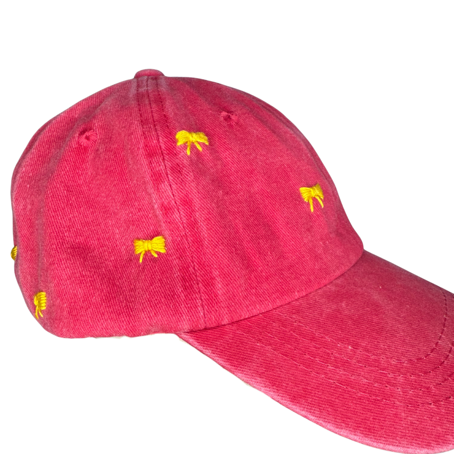 Red cap with yellow bows on a white background