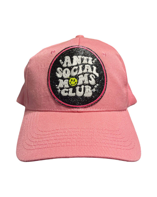 Pink baseball hat with 'Anti-Social Moms Club' black glitter patch.