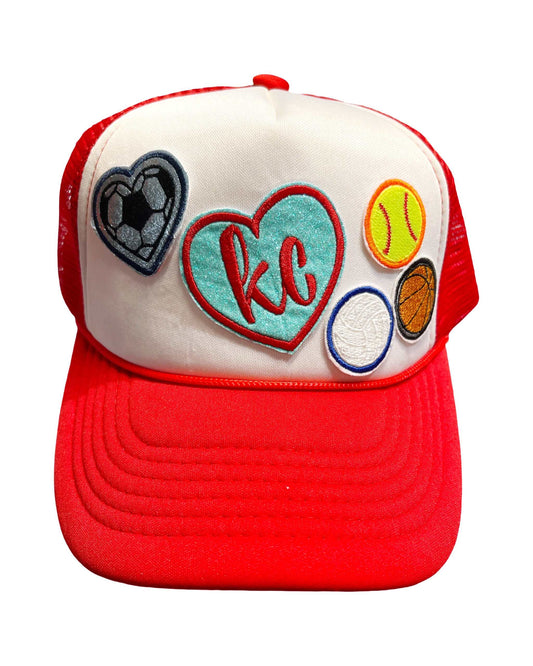 Red & White Trucker Hat with KC sports patches, ideal for Kansas City sports fans.