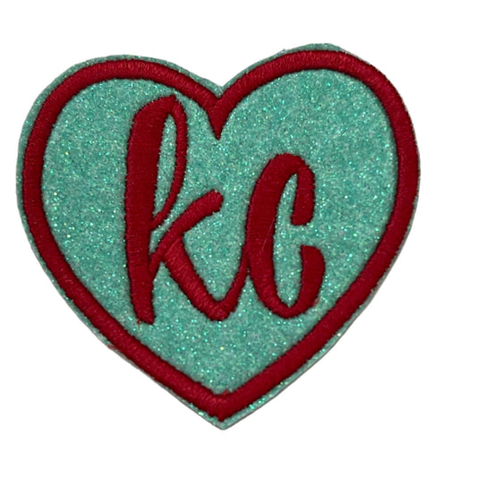 KC Heart iron-on patch in retro KC Current colors with heart design.