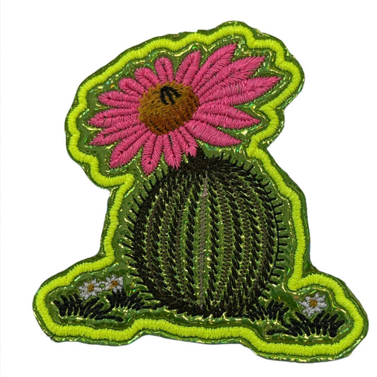 Handmade cactus patch with pink flower, neon yellow outline, and green embroidery.