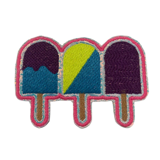 Handmade popsicle patch in purple, bright blue, neon yellow with holographic silver vinyl.