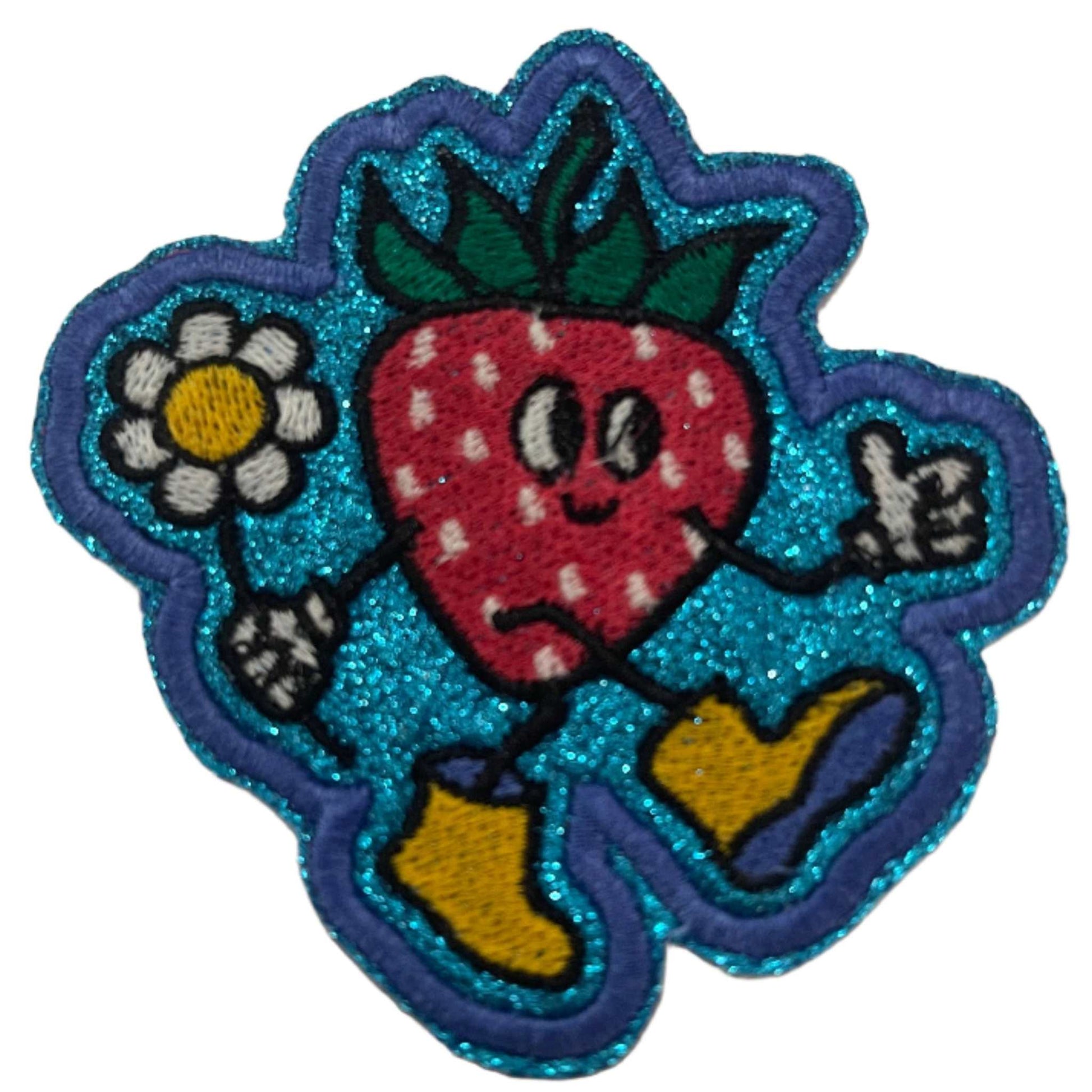 Handmade strawberry in yellow galoshes iron-on patch with a white daisy, blue glitter background.