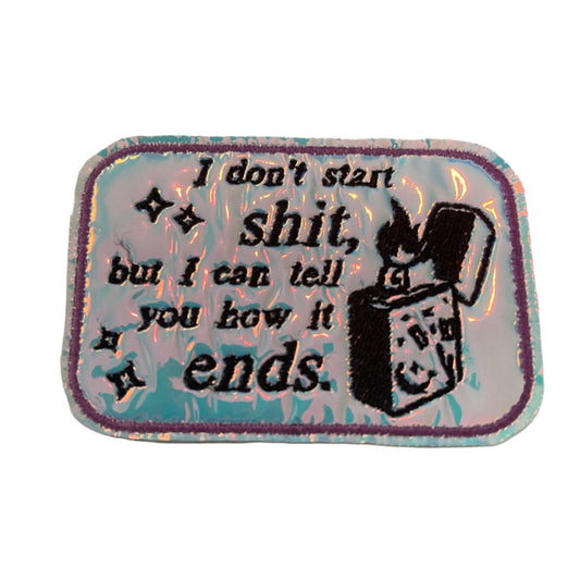 Handmade Taylor Swift inspired iron-on patch with lit lighter, celestial theme, and holographic border.