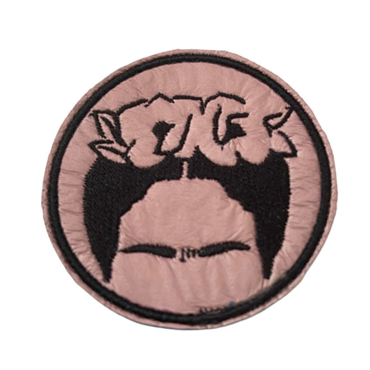 Handmade Frida Kahlo iron-on patch, black and pink illustration with artistic design.