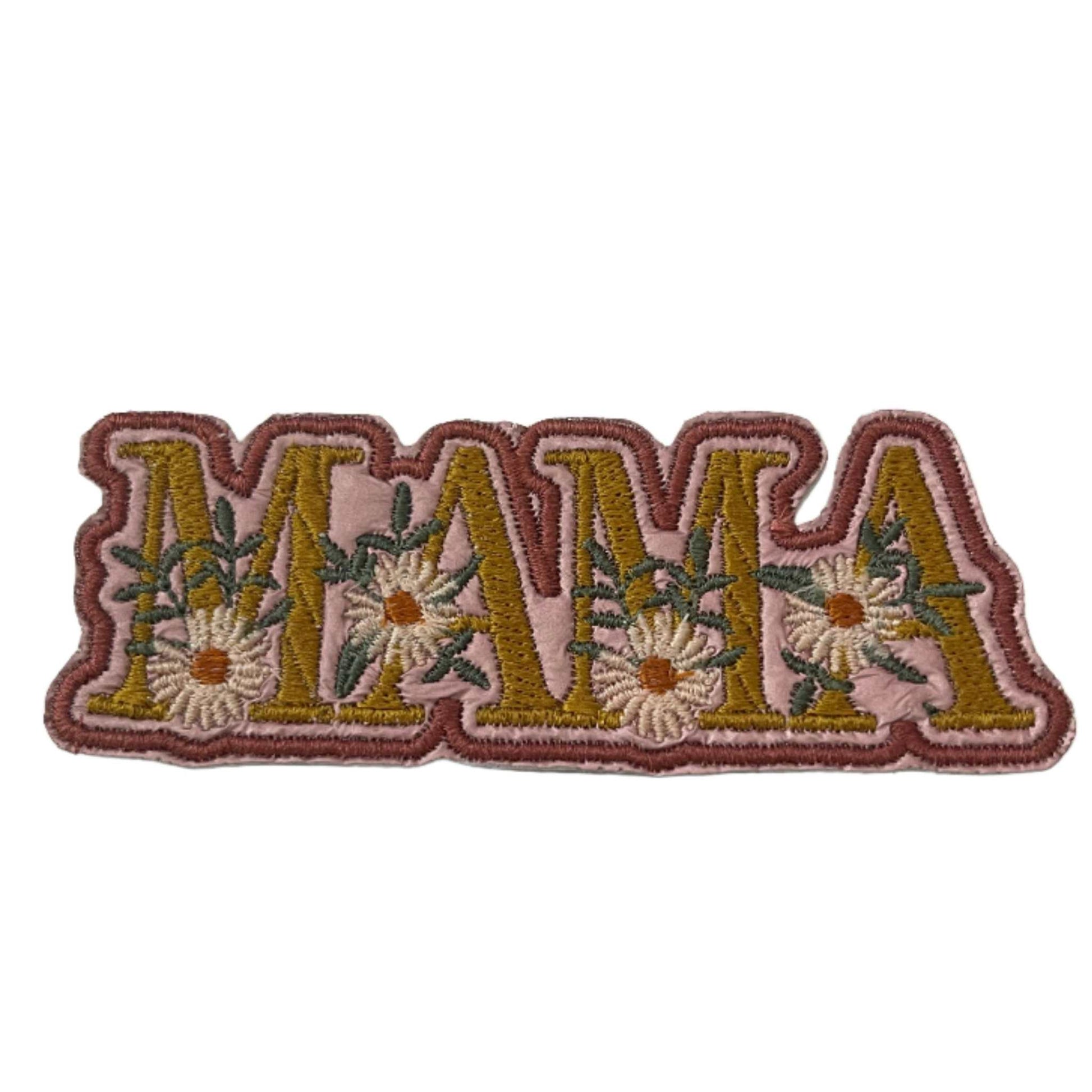 MAMA with daisies on rose gold background, greenish yellow letters, off white daisies, sagey green leaves, mauve outline.