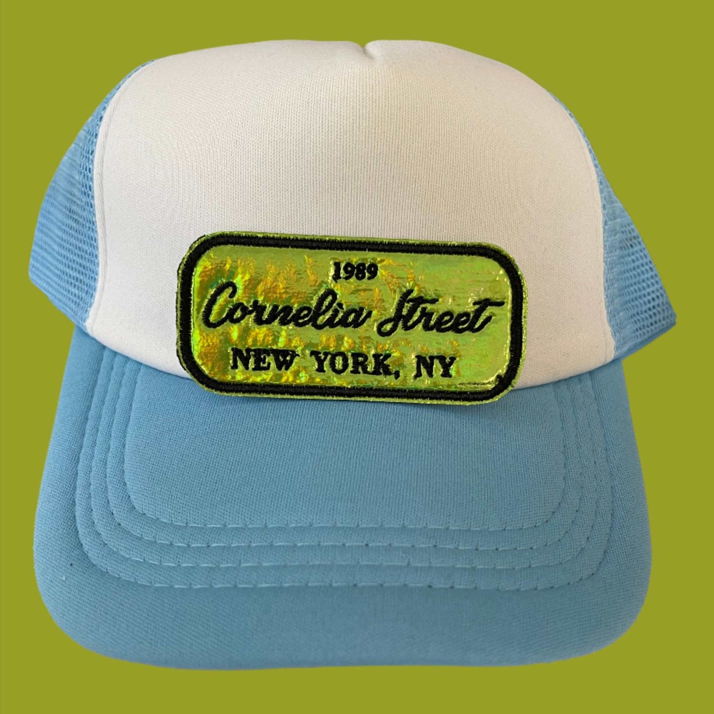Iron-on patch featuring "Cornelia Street," "1989," and "New York, NY" in a sleek design, celebrating Taylor Swift's iconic song and NYC residence.