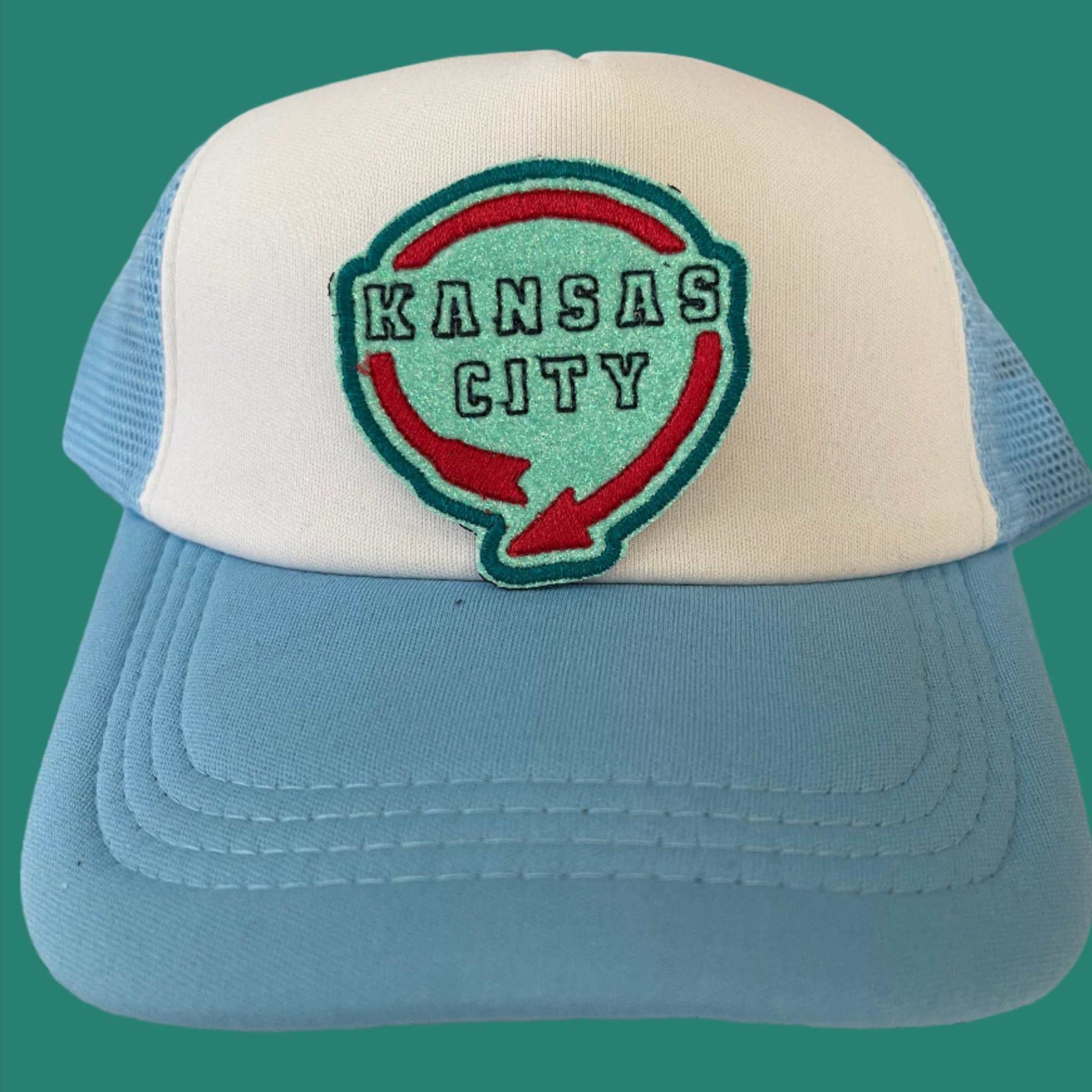 Iron-on patch featuring a design inspired by the Western Auto Building sign in Kansas City, showcasing a stylish and retro aesthetic.