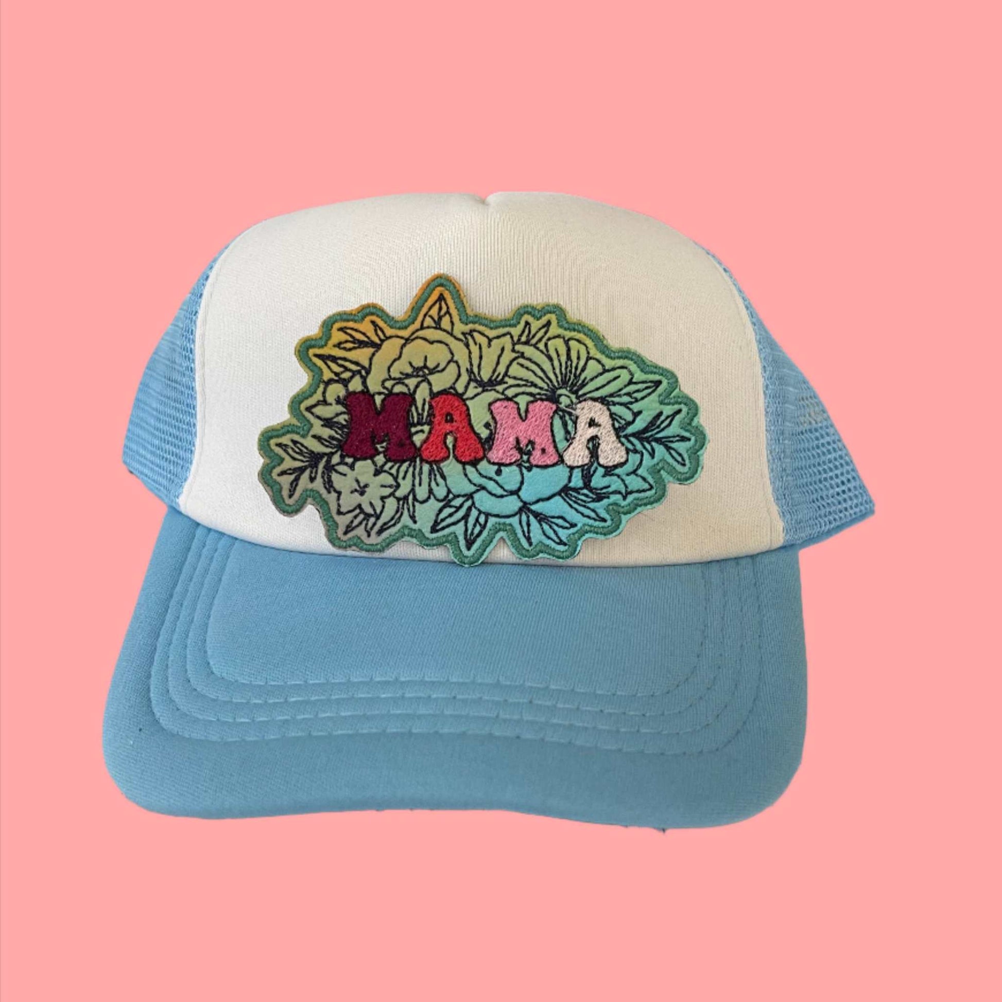 Funky iron-on patch featuring vibrant floral designs and the word "MAMA" in bold, eye-catching letters, showcasing a stylish and retro aesthetic.