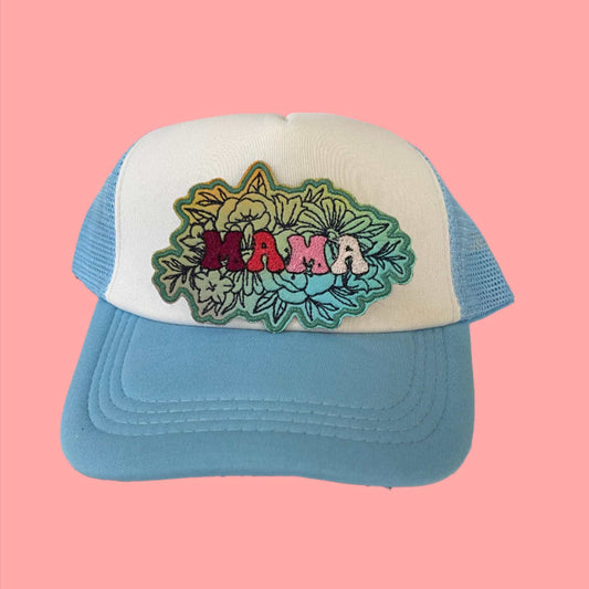 Funky iron-on patch featuring vibrant floral designs and the word "MAMA" in bold, eye-catching letters, showcasing a stylish and retro aesthetic.