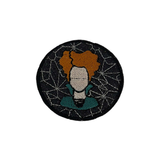 Hocus Pocus Winifred Sanderson embroidered patch with vivid design on black circular background.