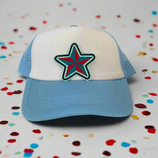Close-up of a star embroidered patch in Kansas City Current team colors, perfect for customizing hats and other accessories.