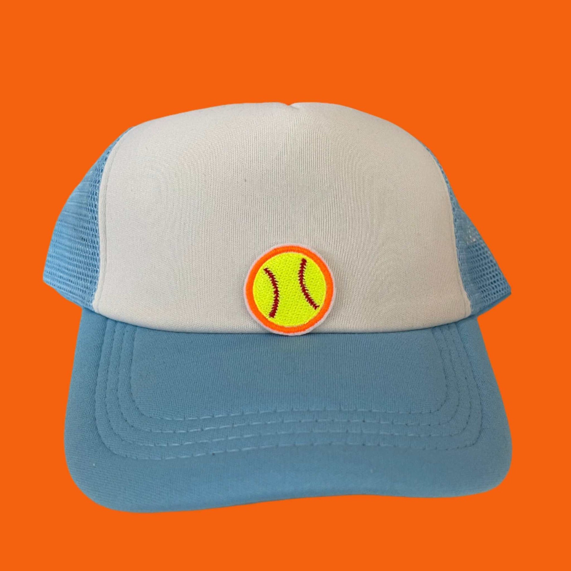 Close-up of a softball embroidered patch with bright yellow and red detailing, perfect for customizing hats and other accessories.