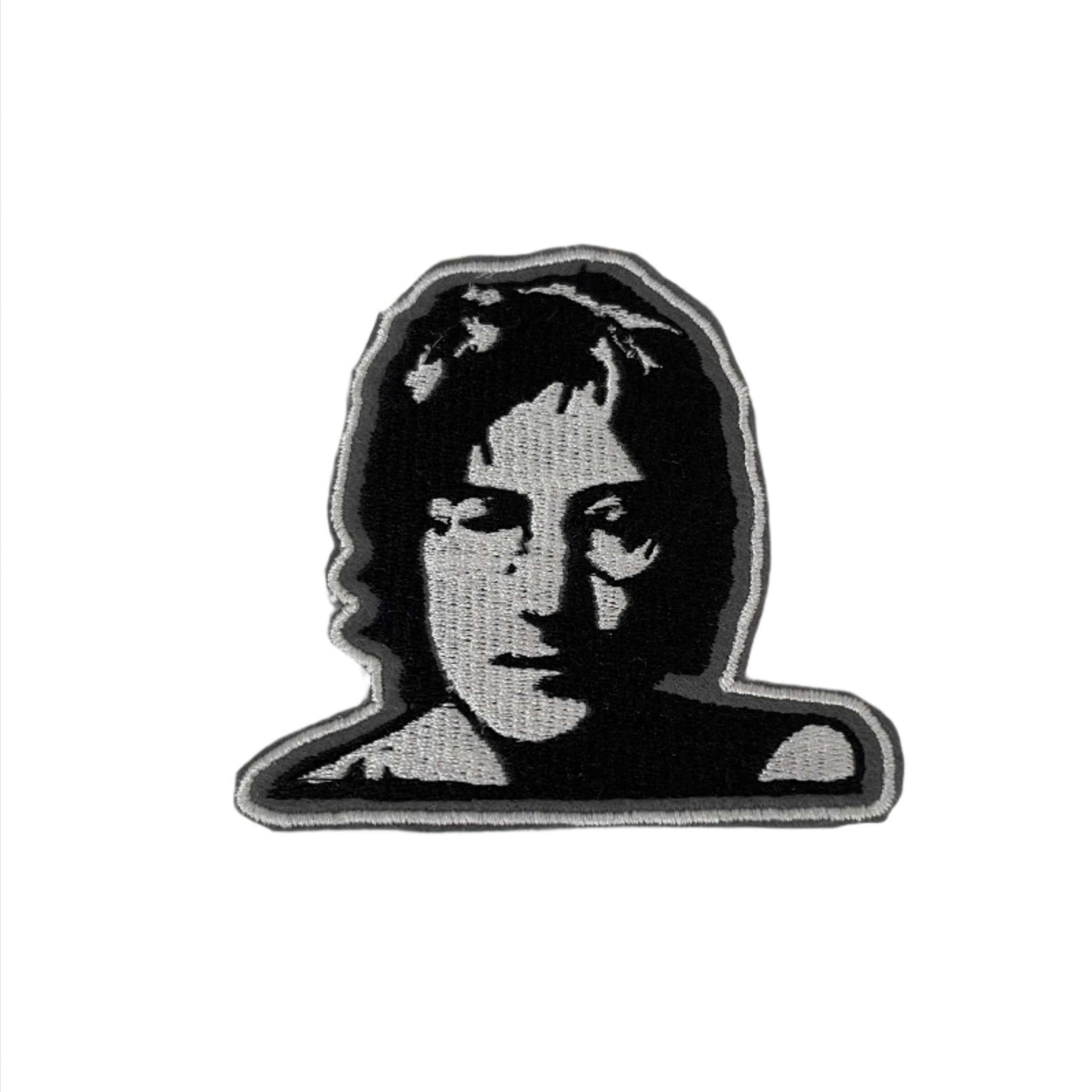 John Lennon embroidered patch with black and white design featuring his face.