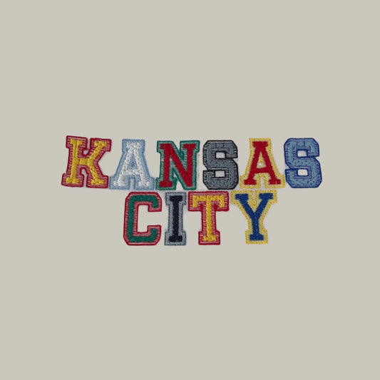 Kansas City embroidered patch with team colors of Chiefs, Royals, Sporting KC, KC Current.