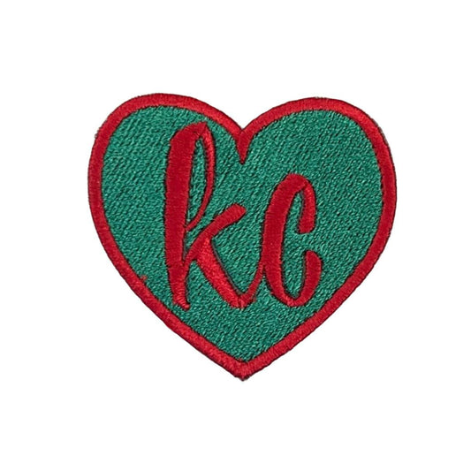 KC Heart Patch with teal heart and red "KC" lettering, Kansas City Current team colors, embroidered design.