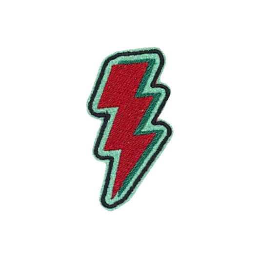 Vibrant lightning bolt patch in Kansas City Current team colors red and green.