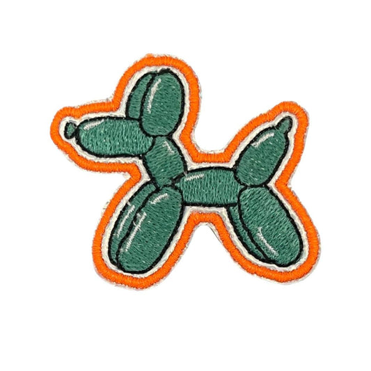Colorful balloon dog patch with green and orange hues, ideal for customizing hats and accessories.
