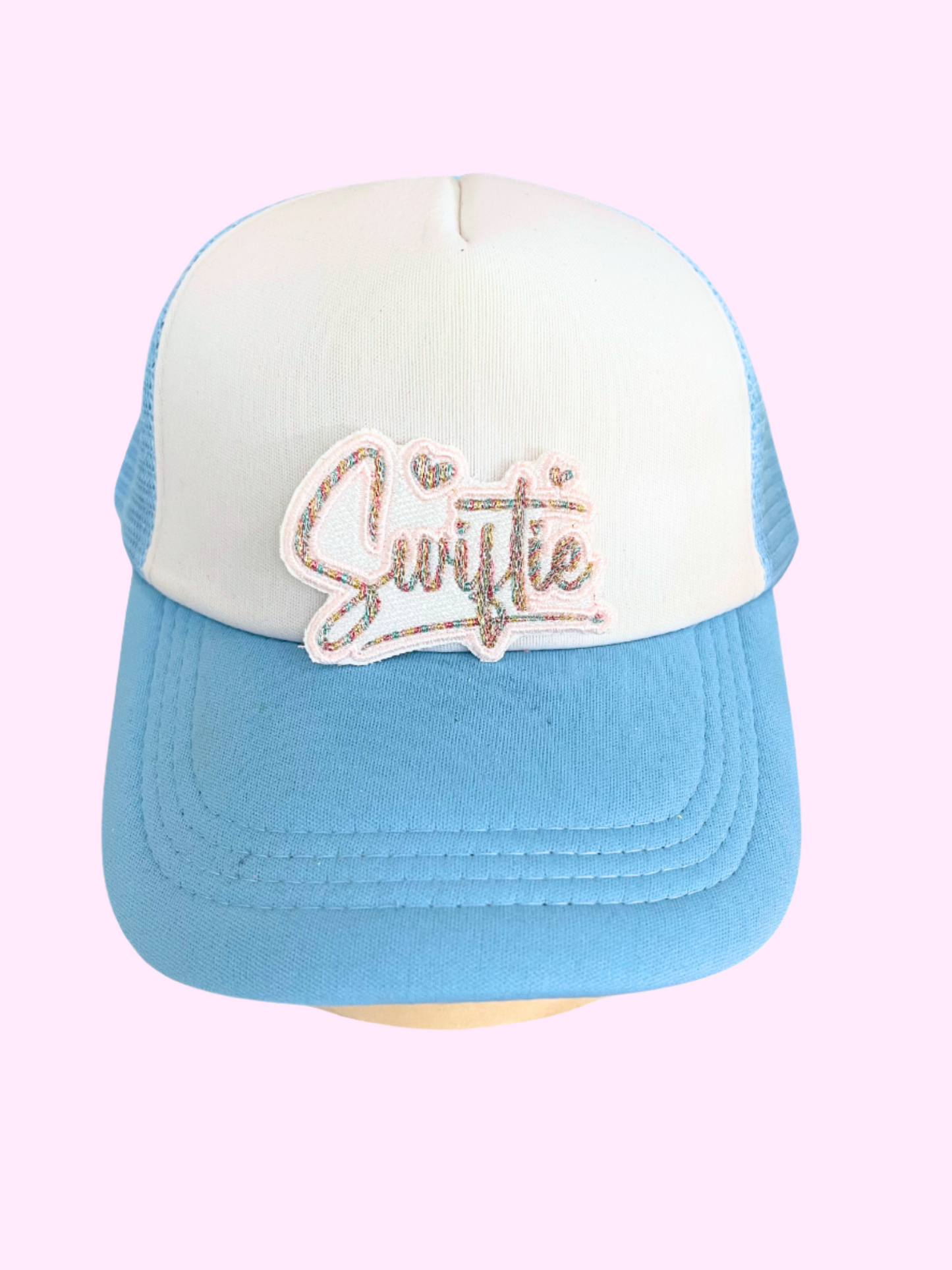 Handmade Swiftie patch with sparkling embroidery and heart accents.