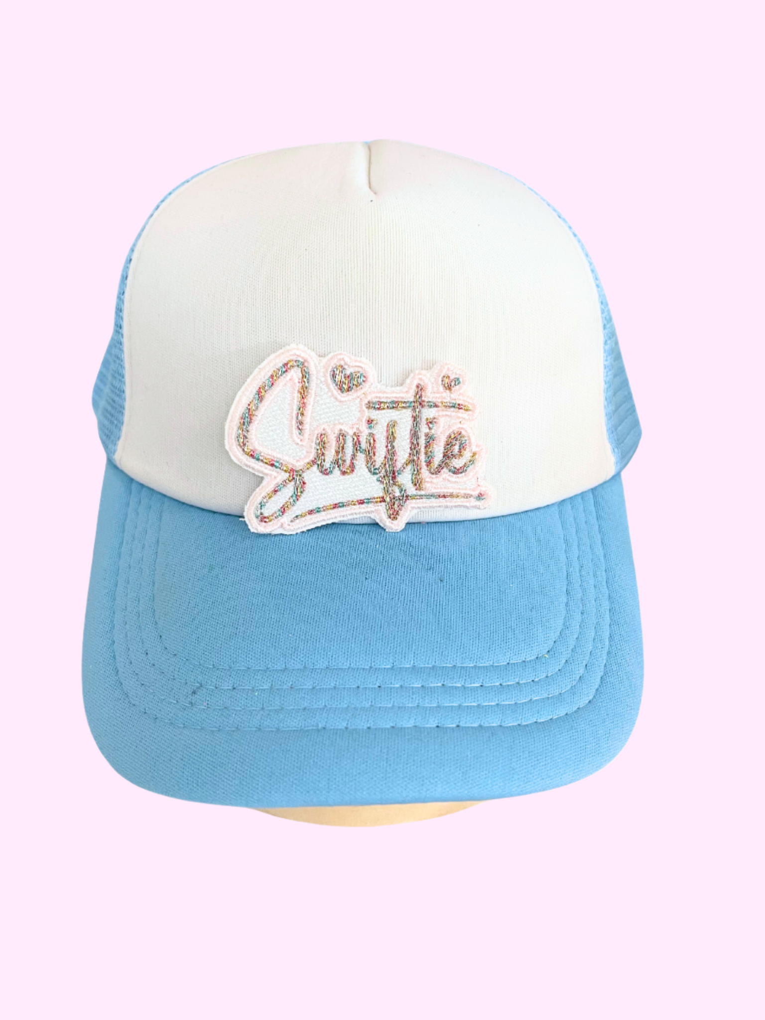 Handmade Swiftie patch with sparkling embroidery and heart accents.