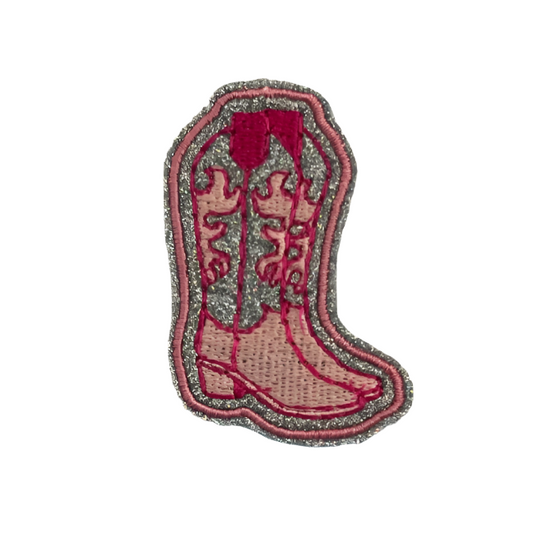 Pink cowboy boot iron-on patch with vibrant embroidery in pink and red, adding Western charm to fashion items.