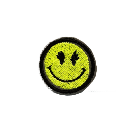 Retro smiley face iron-on patch in yellow and black embroidery.