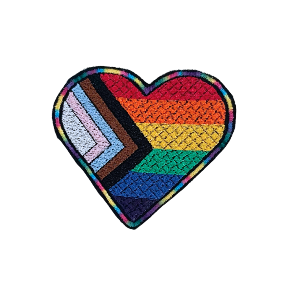 Custom embroidered LGBTQIA+ heart patch with rainbow design.