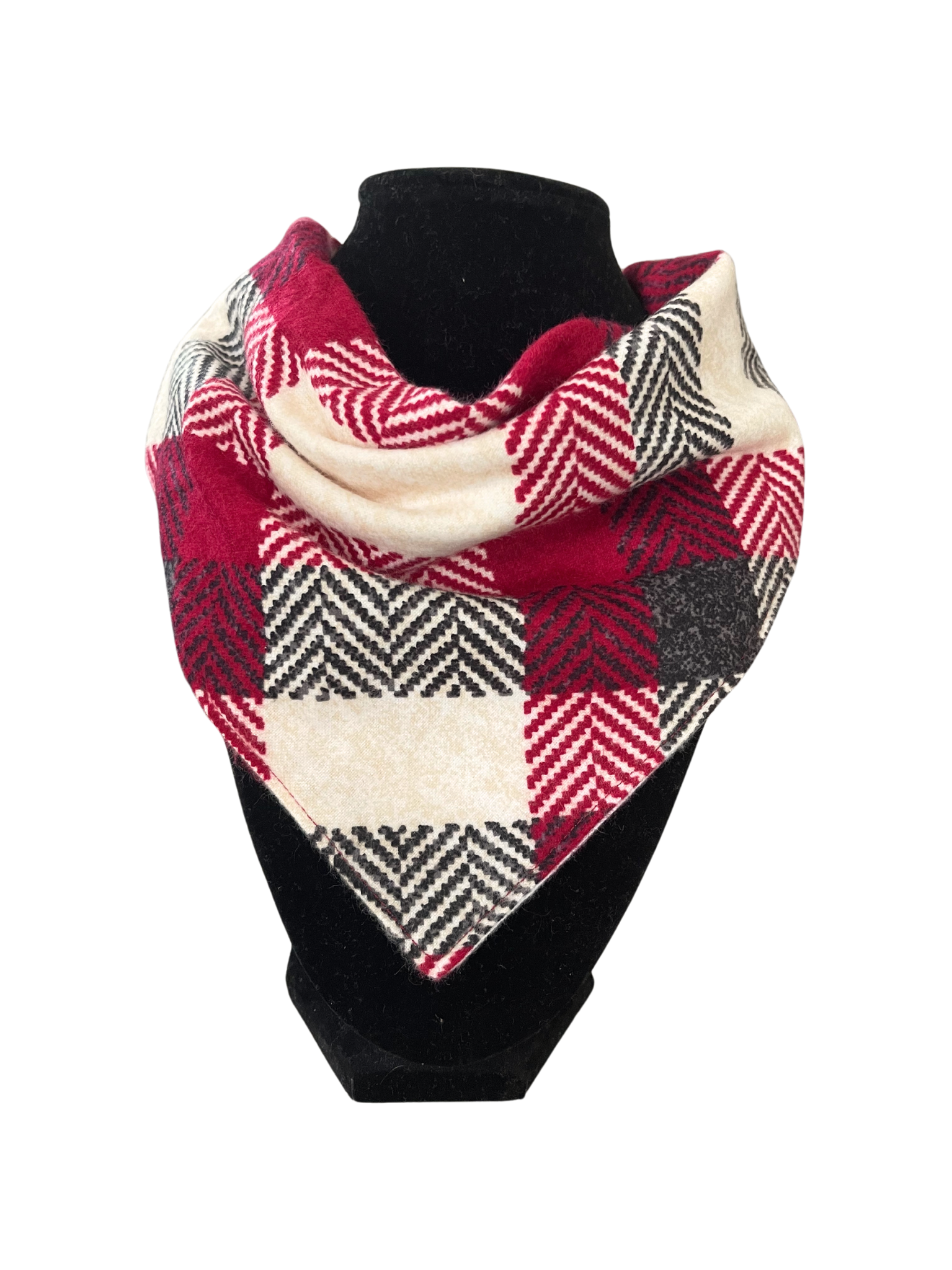Reversible red and black plaid bib-dana with adjustable snap closures.