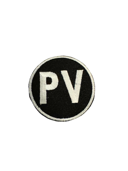 PV white letters on black patch design.