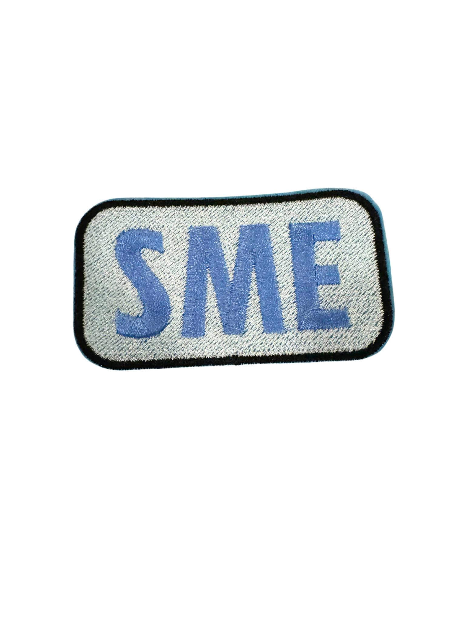 SME patch blue on white fabric background