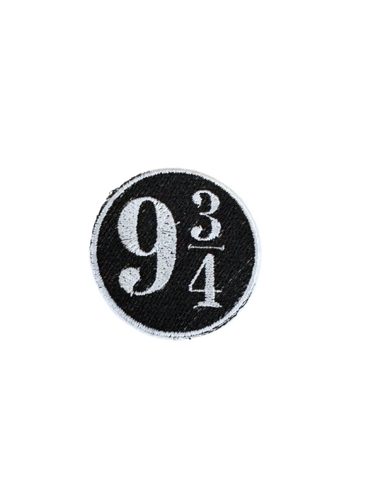 Platform 9¾ patch on white background for customizable hat option.