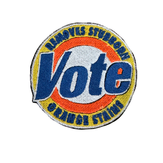 "Vote" handmade patch with slogan "Removes Stubborn Orange Stains" for custom hats, koozies, and bags.