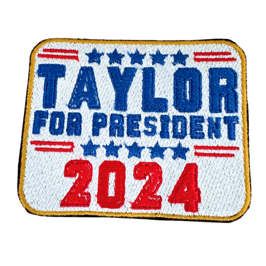 Taylor for President 2024 handmade patch featuring blue and red lettering with stars, ideal for customizing hats or accessories.