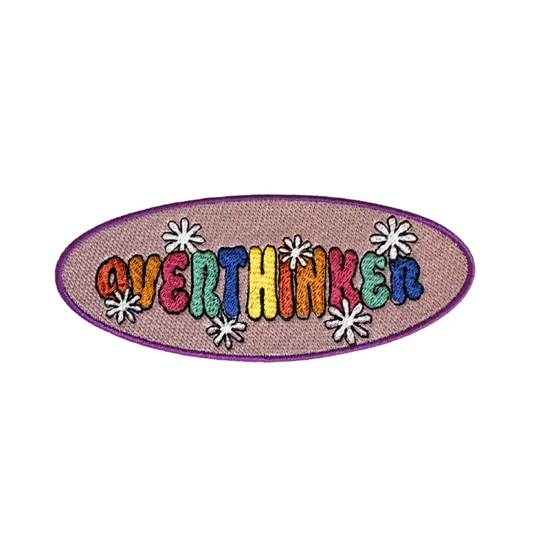 Overthinker patch with retro vibes and playful daisy accents.