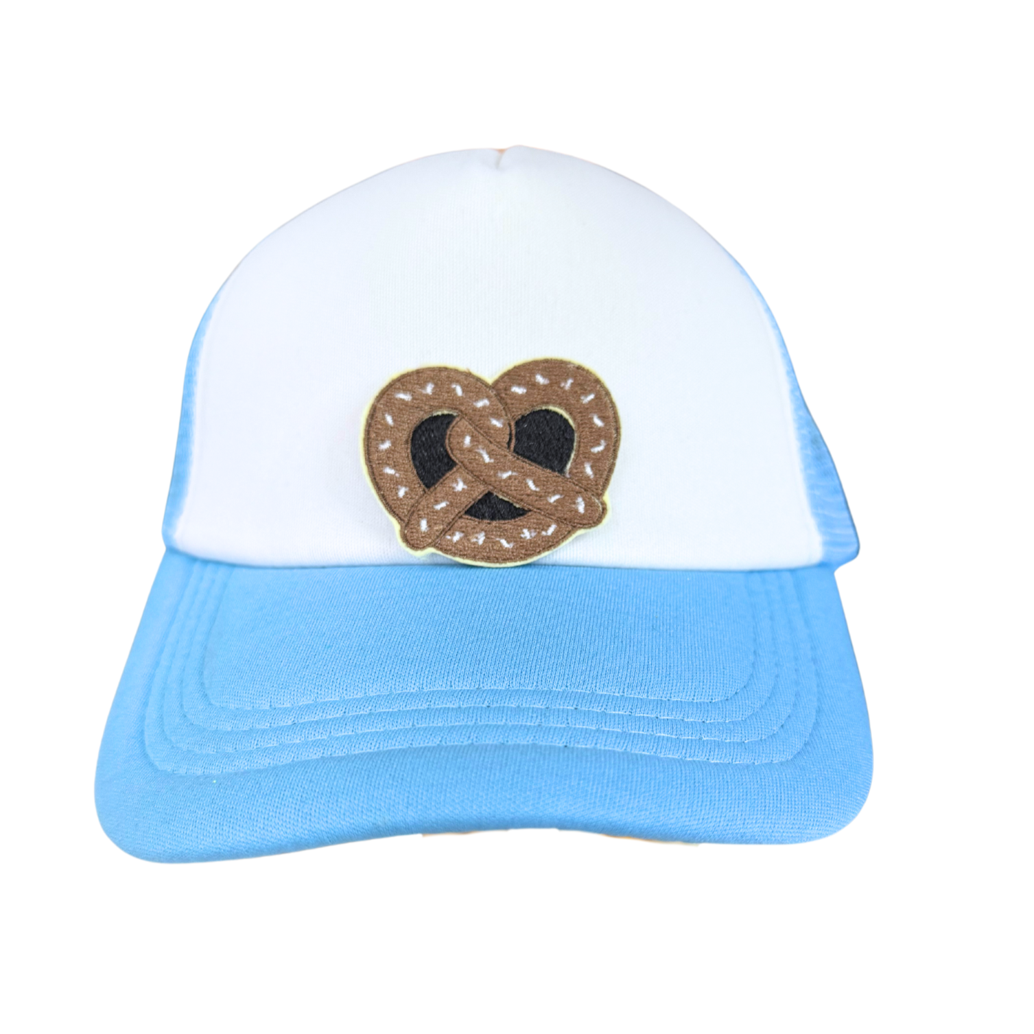 Embroidered brown pretzel patch with white salt accents.

