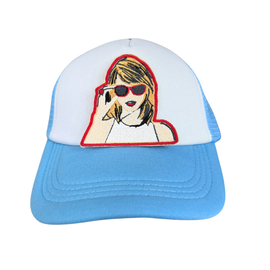 Taylor Swift patch with red sunglasses design.

