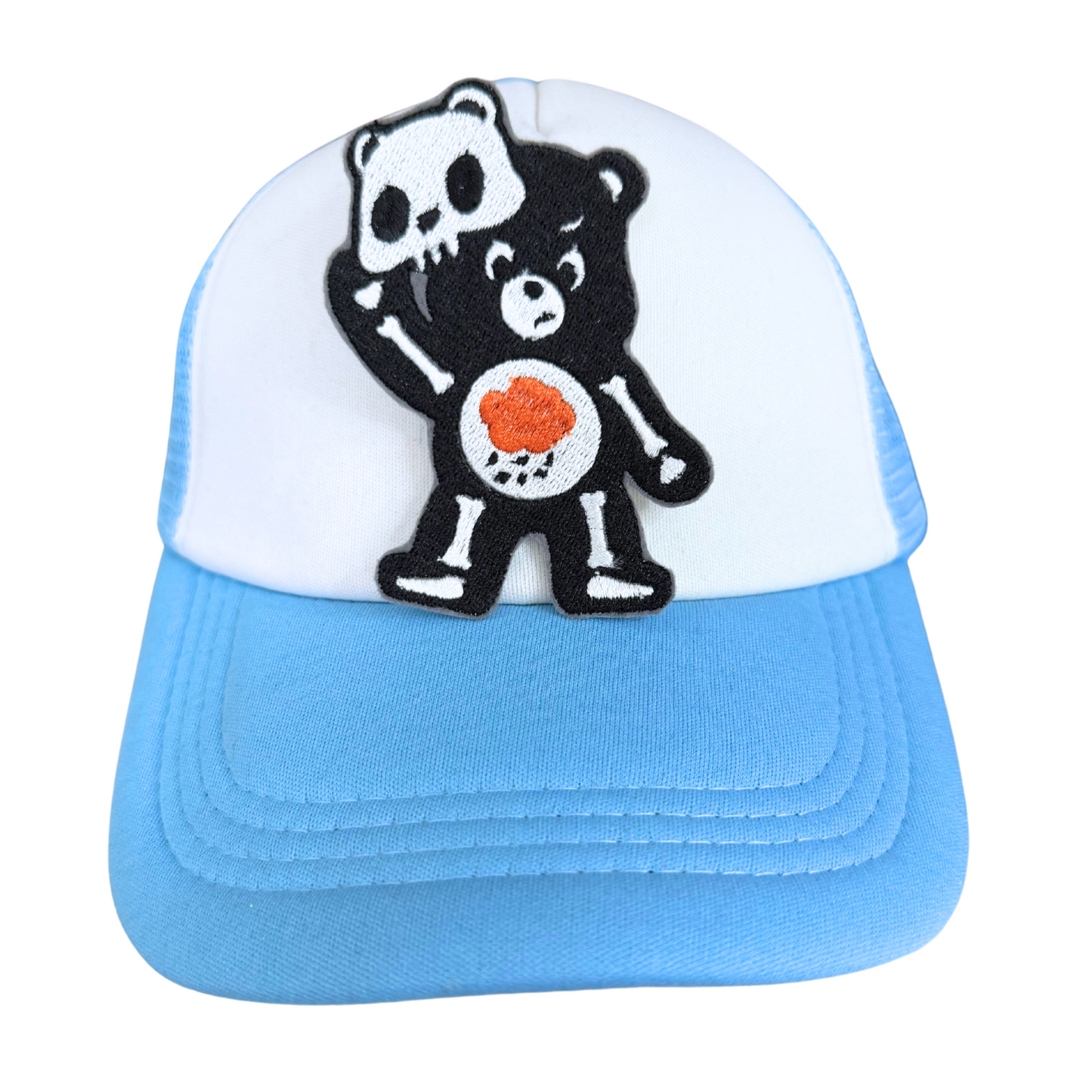 Black Skeleton Bear patch with a heart design, showcasing a spooky yet adorable vibe.

