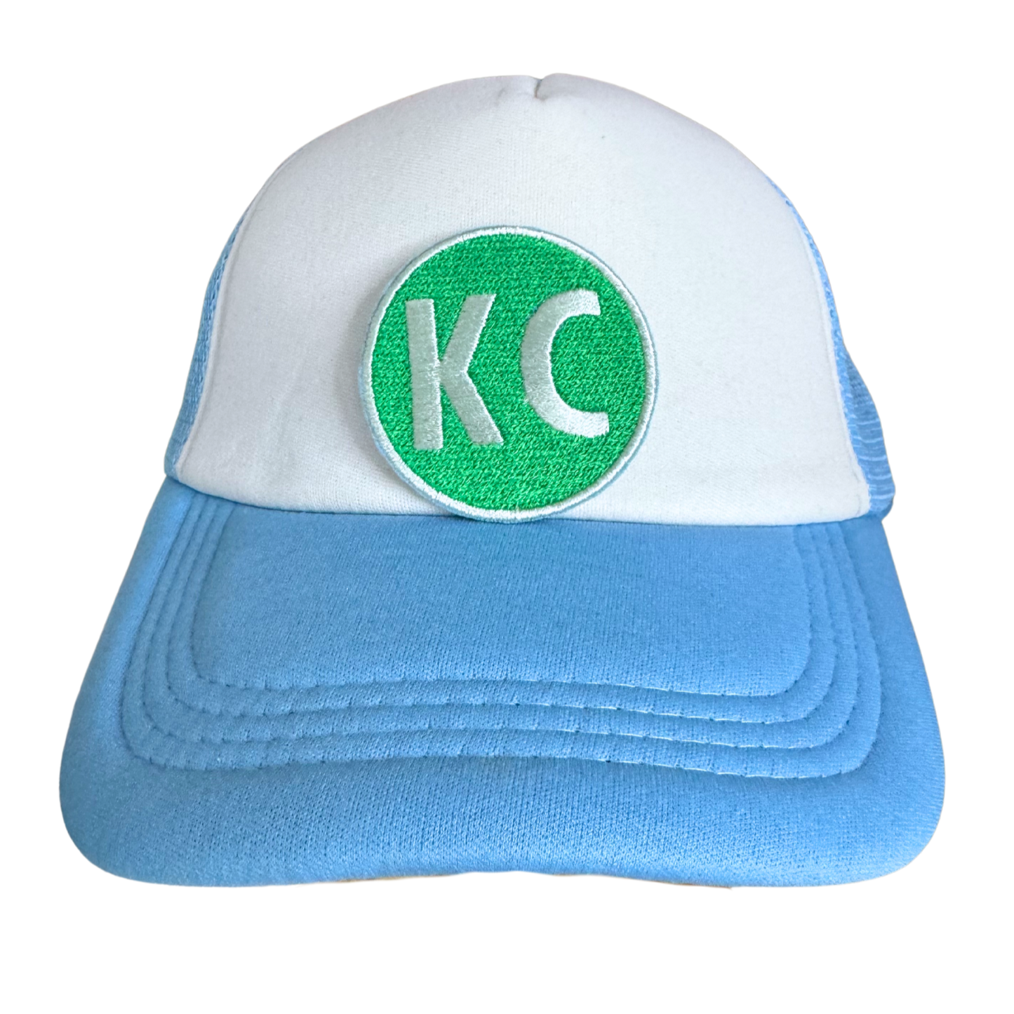 Kansas City Irish Green KC Patch with white letters, perfect for customization on hats or accessories.

