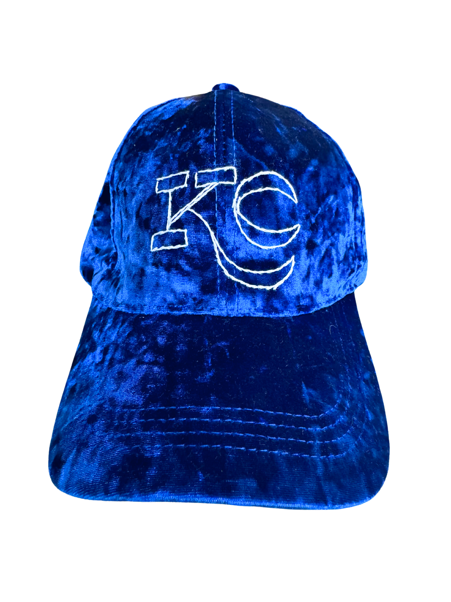 Royal blue velvet hat with hand-embroidered KC logo in white.