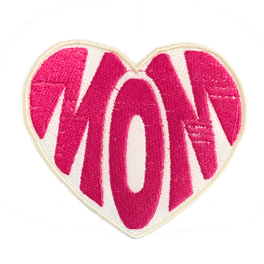 Custom embroidered MOM patch with vibrant pink lettering in a heart shape, trendy accessory.