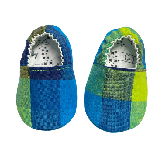 Blue and green plaid baby shoes with soft soles, handmade in Kansas City.