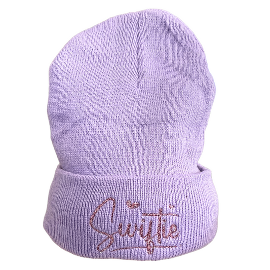 Youth lavender beanie with pink metallic "Swiftie" embroidery.