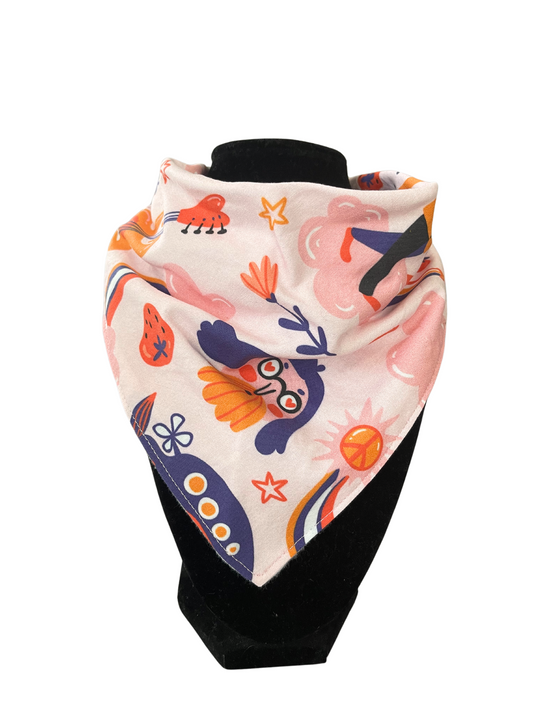 Reversible Beatles-themed bib-dana for babies and kids with adjustable snap closures.