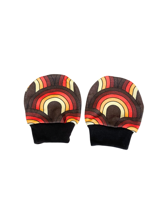 Retro rainbow baby scratch mittens with black cuffs, organic cotton knit, newborn to 6 months.