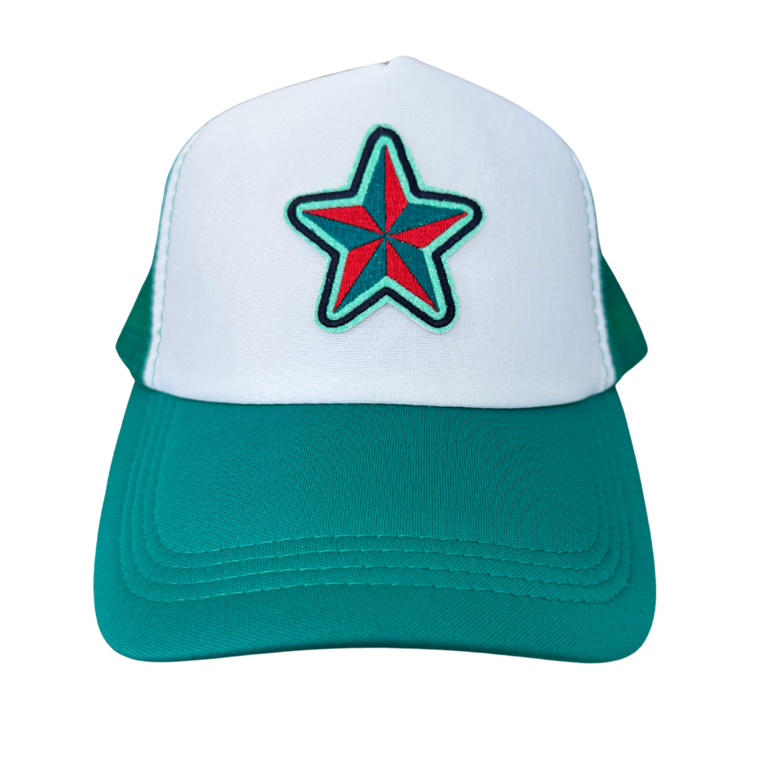 KC Current Star Trucker Hat with red and teal embroidered star patch on white and green background.