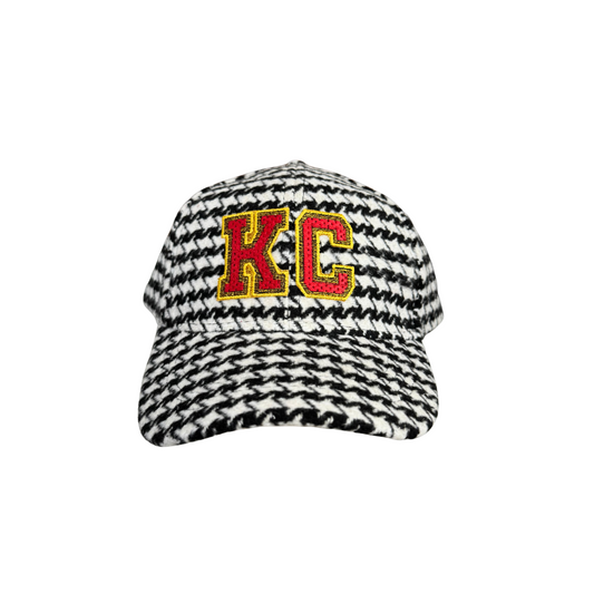 Adult size houndstooth KC hat in Kansas City Chiefs colors, black-and-white pattern.