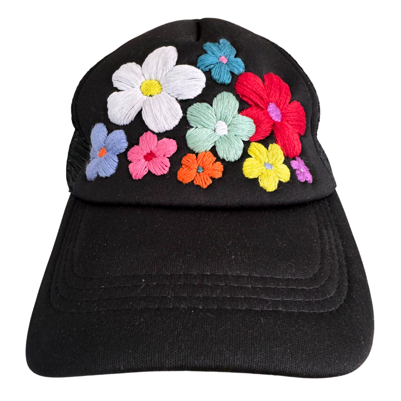 Black floral trucker hat with colorful hand-embroidered flowers, made in Kansas City.
